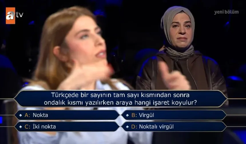 Türkçede bir sayının tam sayı kısmından sonra ondalık kısmı yazılırken araya hangi işaret koyulur?