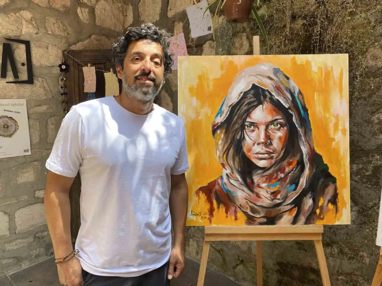 ozel-isitme-engelli-sanatci-duygularini-resimlerle-ifade-ediyor